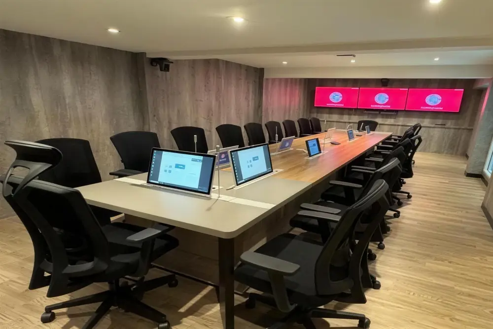 ห้องประชุมไร้กระดาษที่โชว์รูม 1-TO-ALL พร้อมจอยกขึ้นทุกที่นั่ง